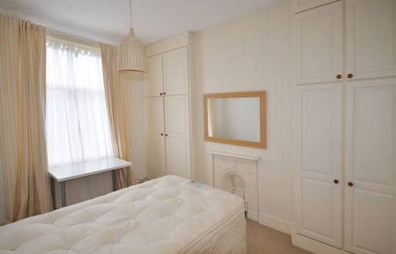 Example student bedroom with built-in wardrobes and desk
